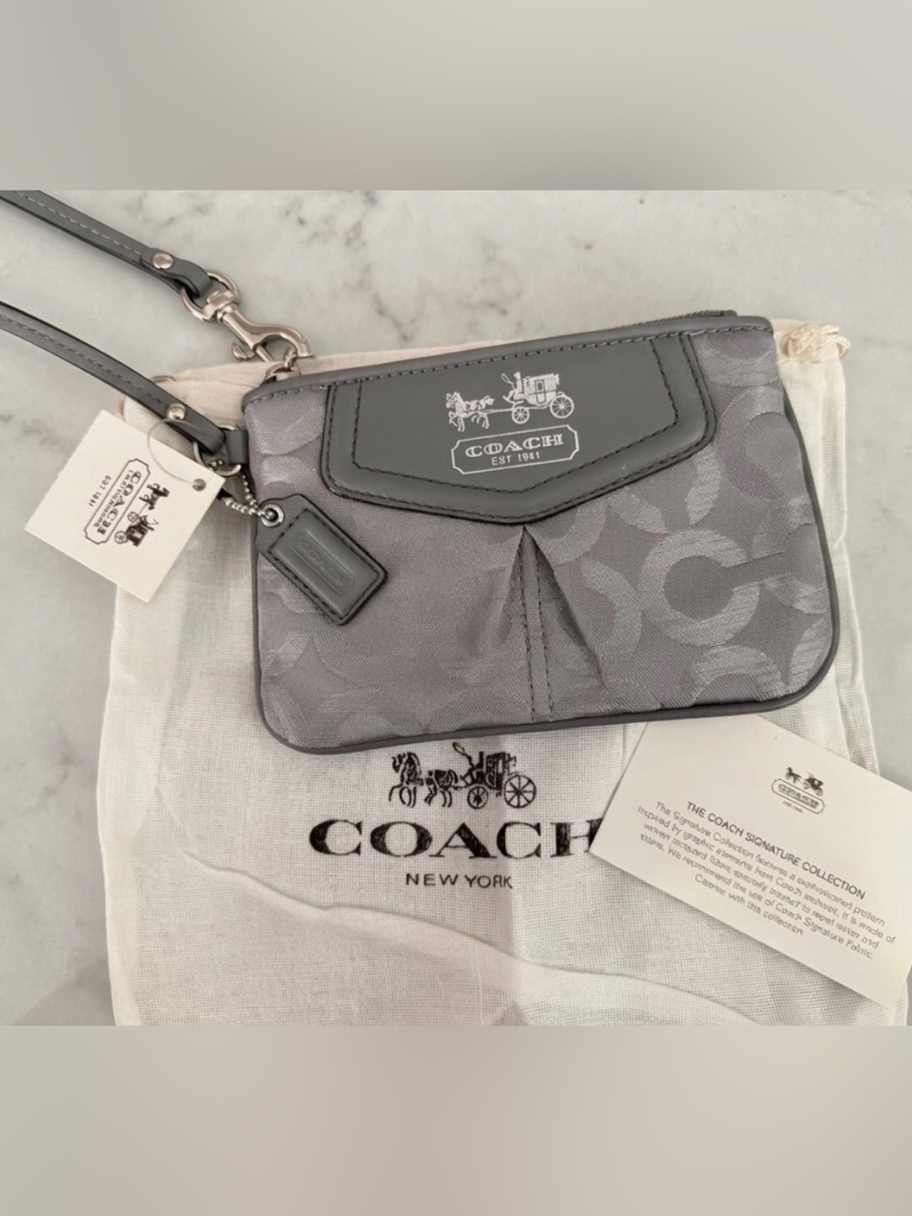 Coach Gray Signature Wristlet with Leather Trim new with tags and dustbag